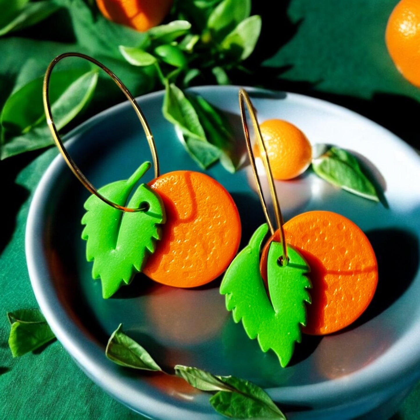 Playful summer earrings inspired by oranges and nature