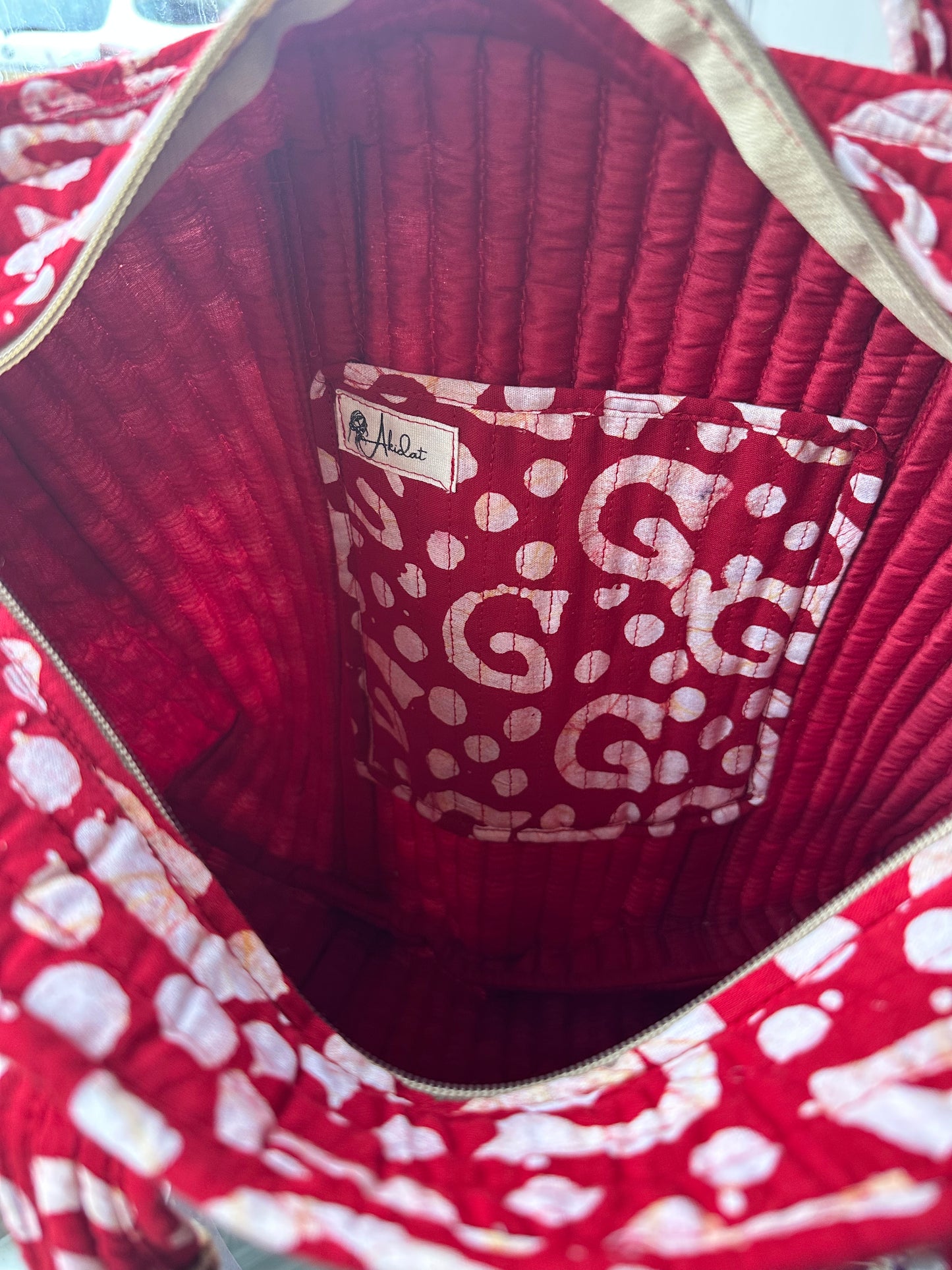 Red Dunes Batik Print Quilted Handmade Zipper Shoulder Bag with Tassels