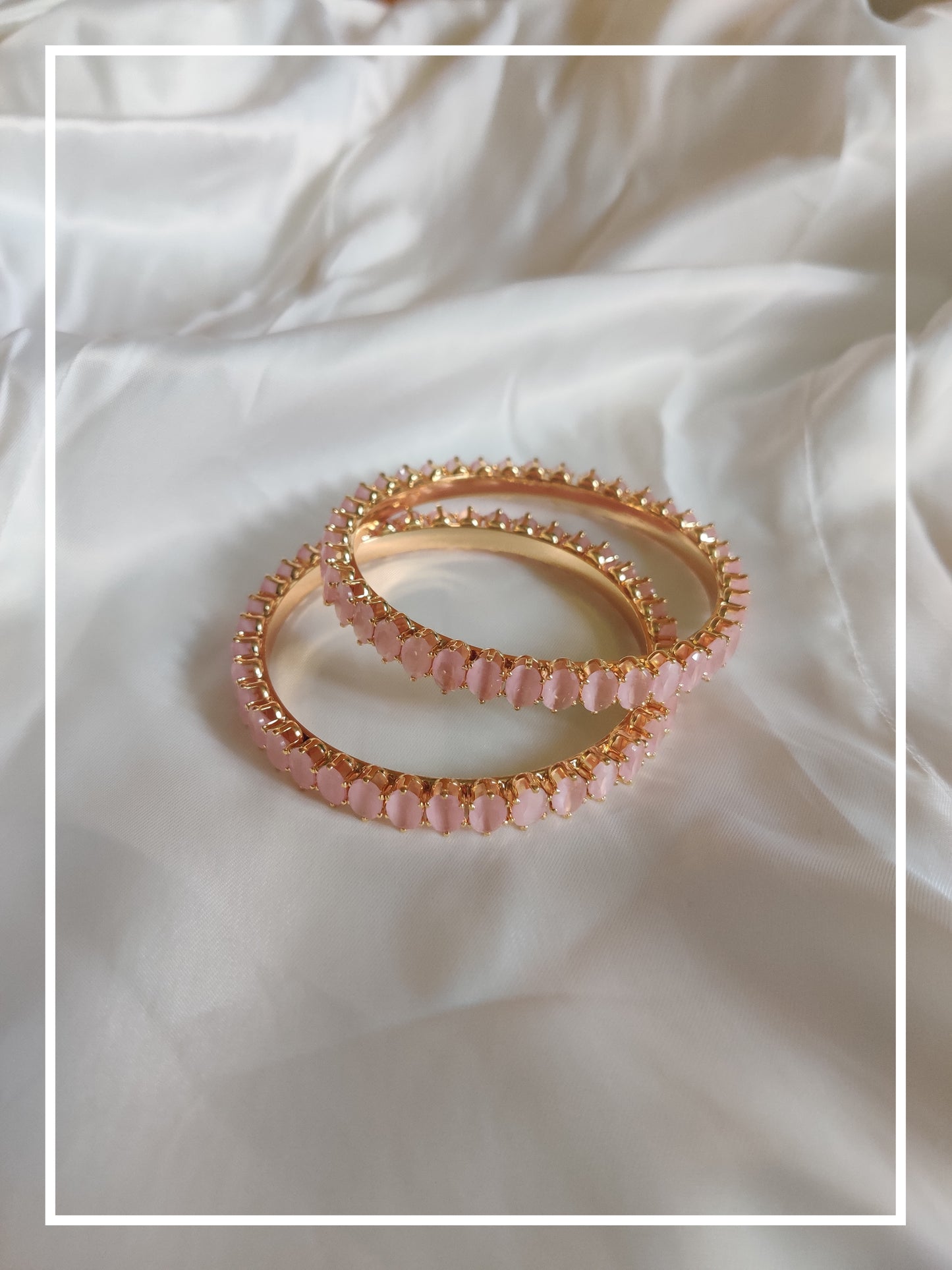Elegant  golden bangles with Baby Pink Stone - Set of 2. Perfect for both Traditional and indo-western look.