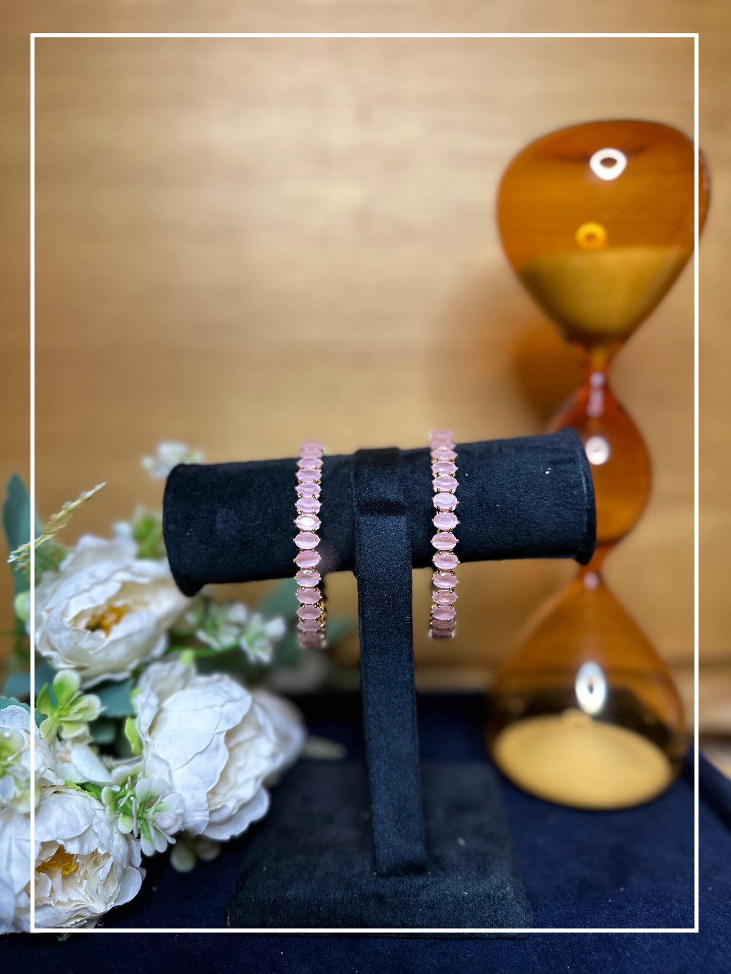 Elegant  golden bangles with Baby Pink Stone - Set of 2. Perfect for both Traditional and indo-western look.