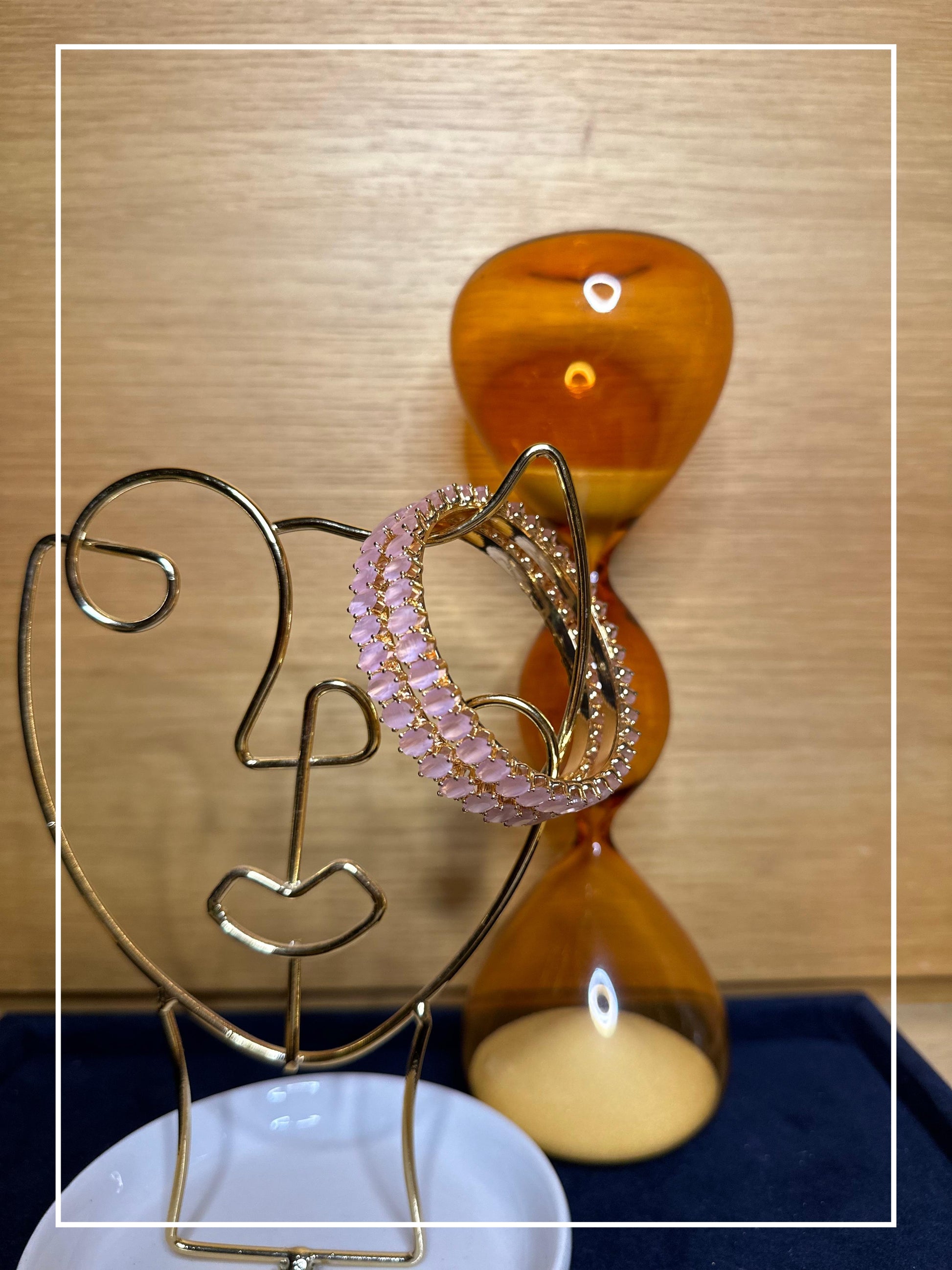 Elegant  golden bangles with Baby Pink Stone - Set of 2. Perfect for both Traditional and indo-western look.