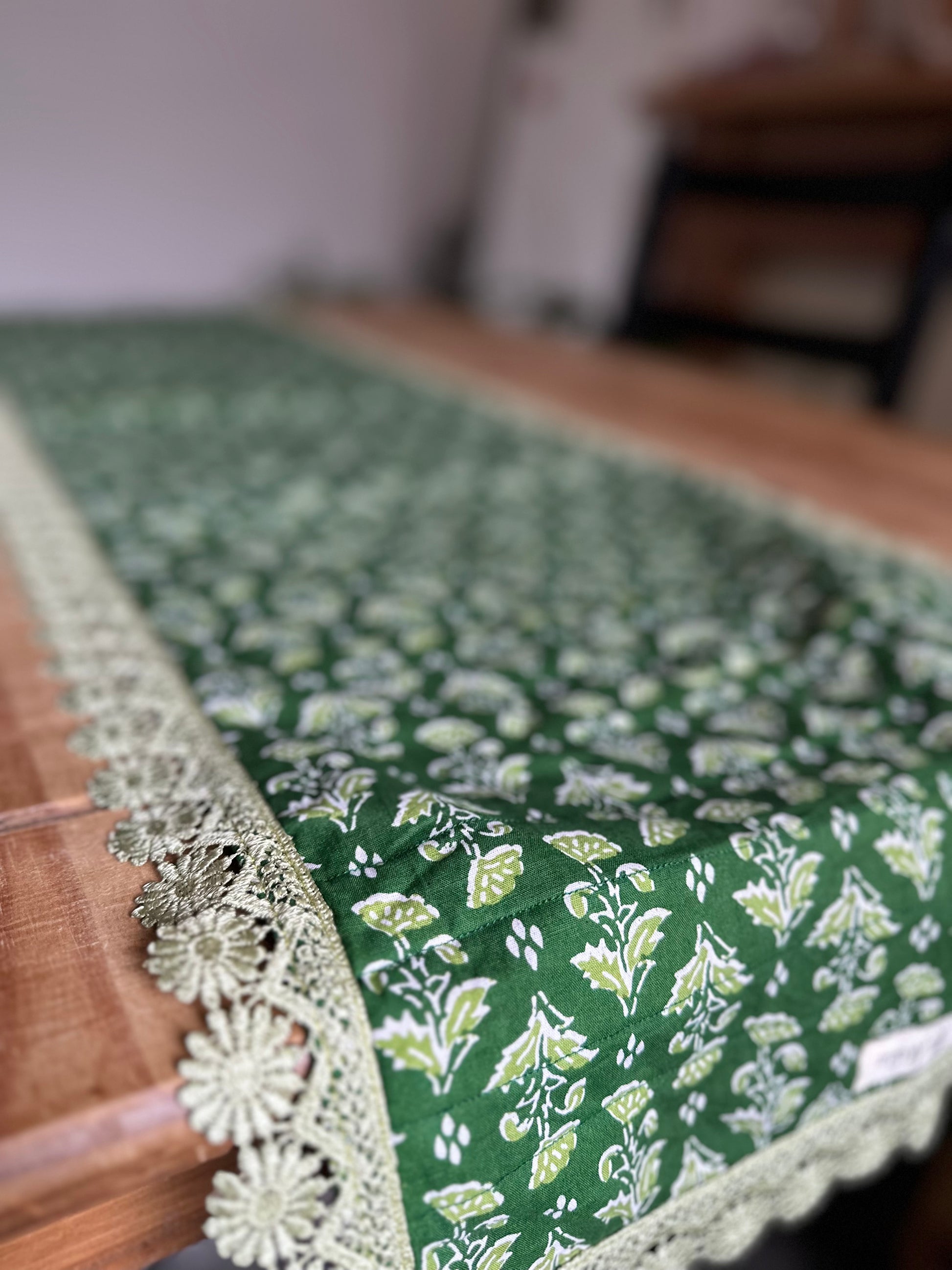 Artisan-made green floral Quilted cotton Hand block printed table runner handcrafted by Akidat