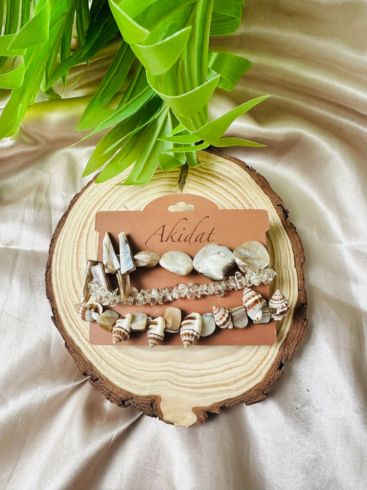 Set of 3 bracelets perfect for beach. Summer Style Handmade Jewellery made with shells and white glass crystals.